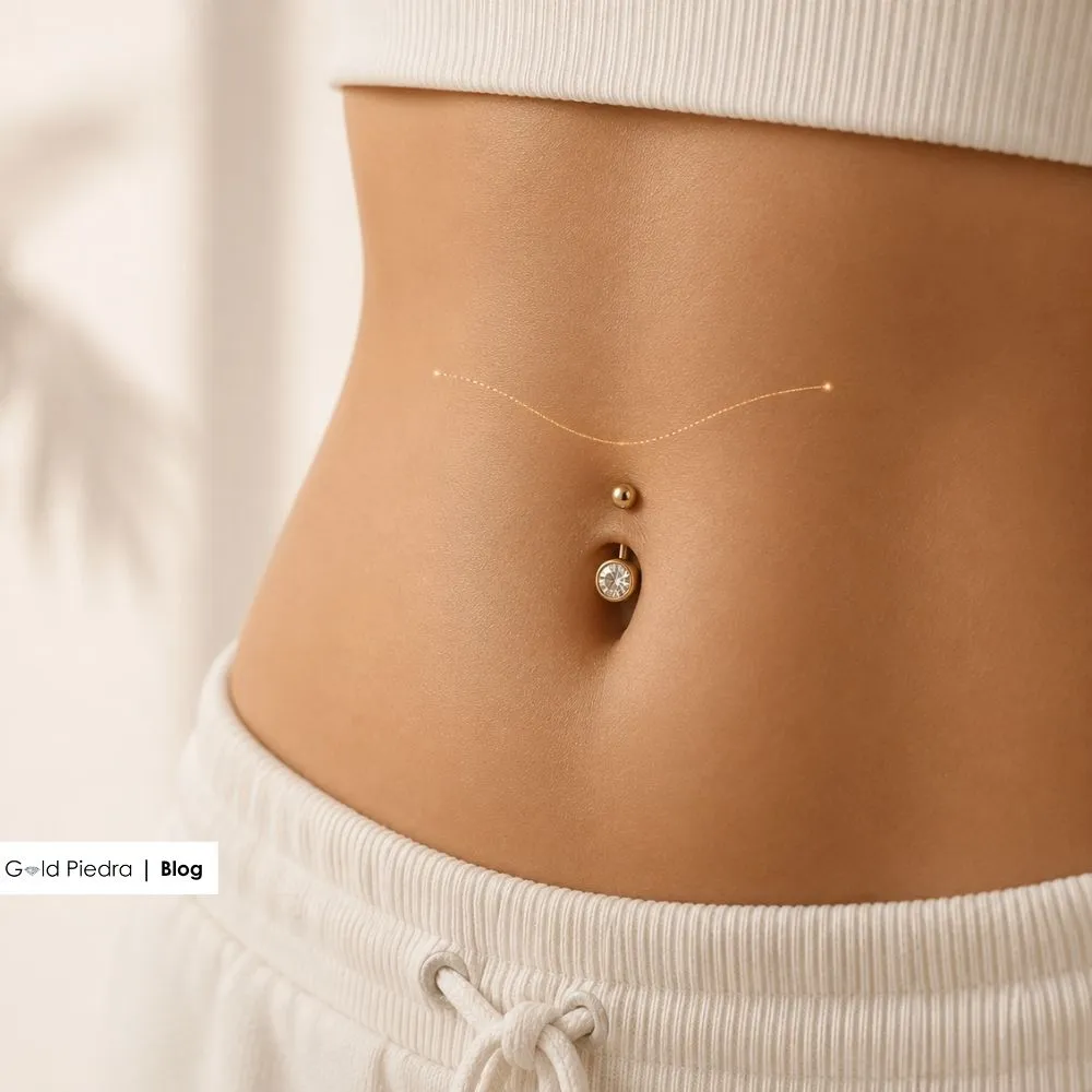 Göbek piercing takılması için ideal olan göbek deliği üstü deri kıvrımının anatomik yapısını gösteren referans çizgisi.